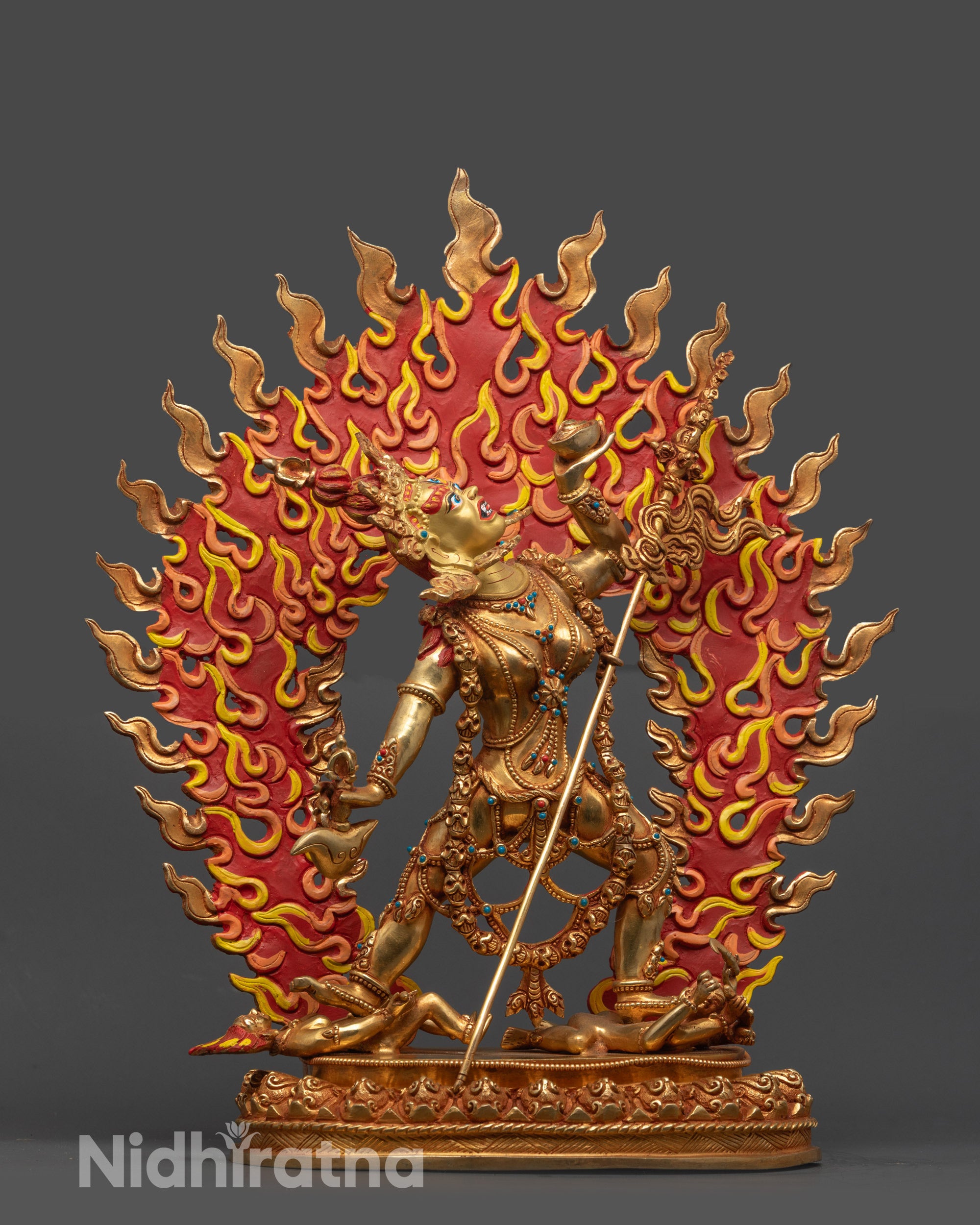Front view of gold-gilded Vajrayogini Statue with third eyes and five-skull crown
