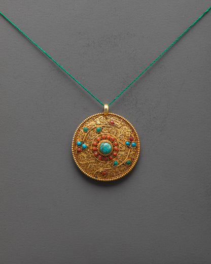 Front view of gold-plated Flower Locket with turquoise and coral stones, handcrafted in Nepal