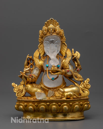 Front view of gold-plated Ganesh statue with crystal elements on lotus throne