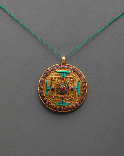 Front view of gold-plated Mandala Locket with intricate filigree and semi-precious gems
