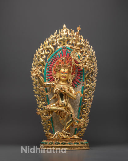 Front view of gold fire-gilded Troma Nagmo statue with wrathful expression and halo