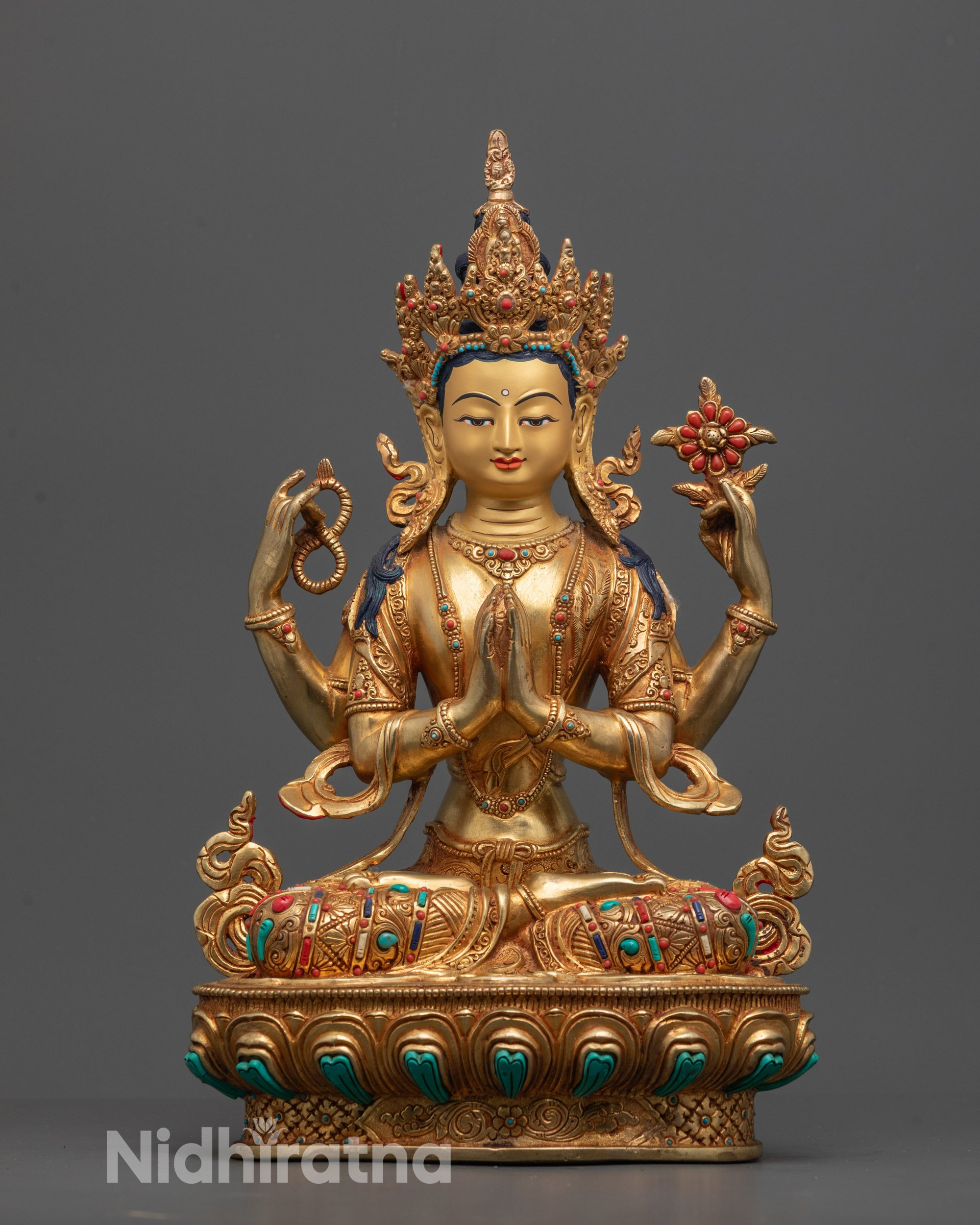 Front view of hand-carved Avalokiteshvara Chenrezig Statue from Nepal with four arms