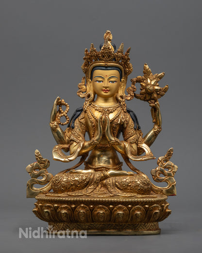 hand-carved Chenrezig Statue gilded in 24k gold with vibrant acrylic detailing – traditional Tibetan Buddhist art from Nepal