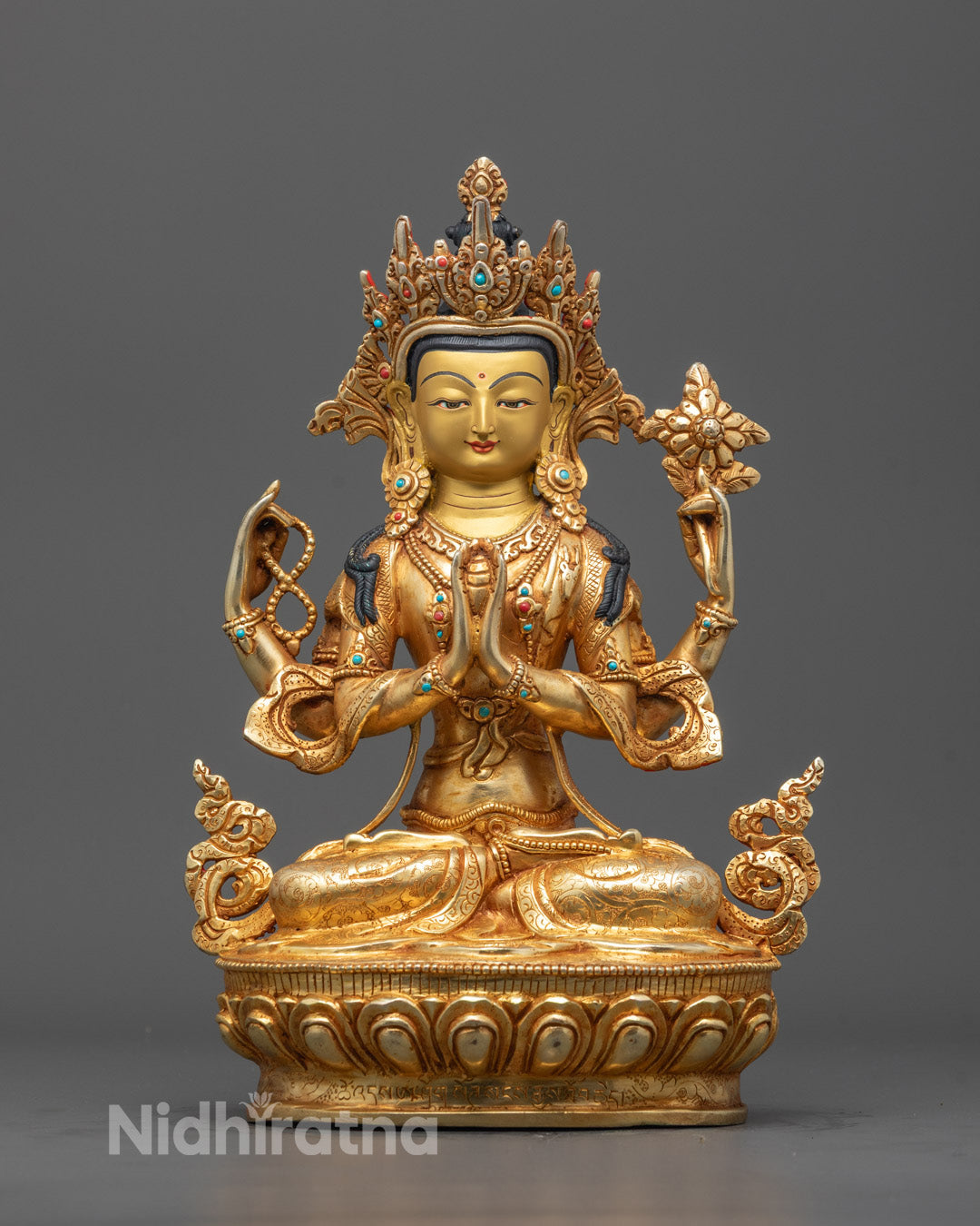 Front view of hand-carved Chenrezig Statue gilded with 24k gold