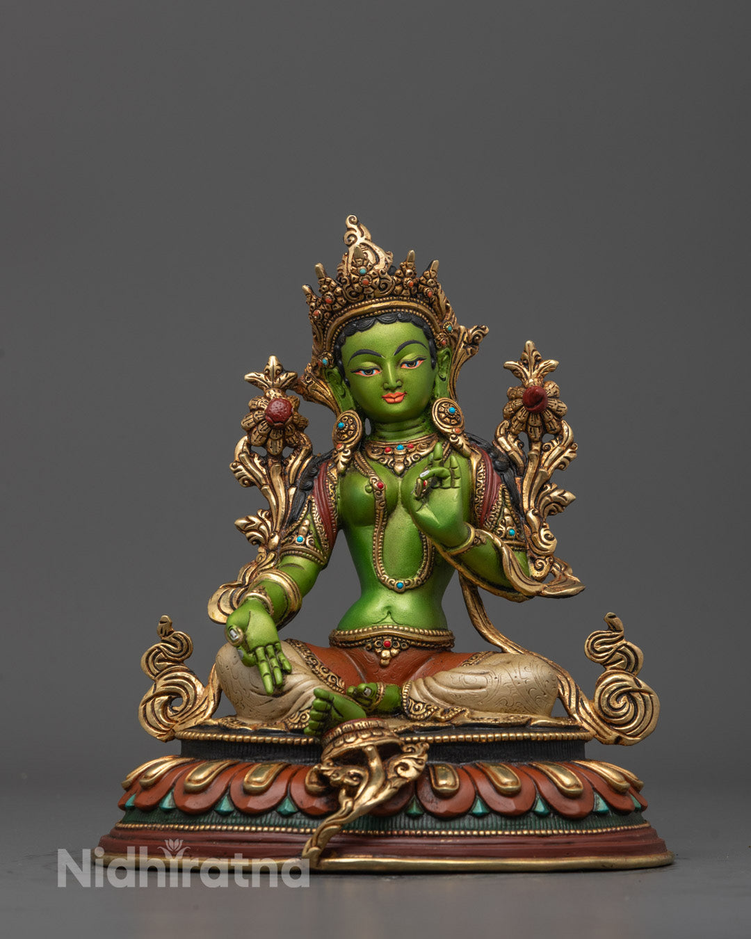 Front view of hand-carved Green Tara Statue in light green color