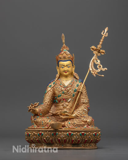 Front view of hand-carved Guru Rinpoche Statue seated on lotus with semi-wrathful expression