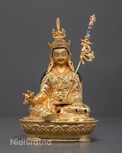 Front view of hand-carved Guru Rinpoche statue with 24k gold fire-gilding