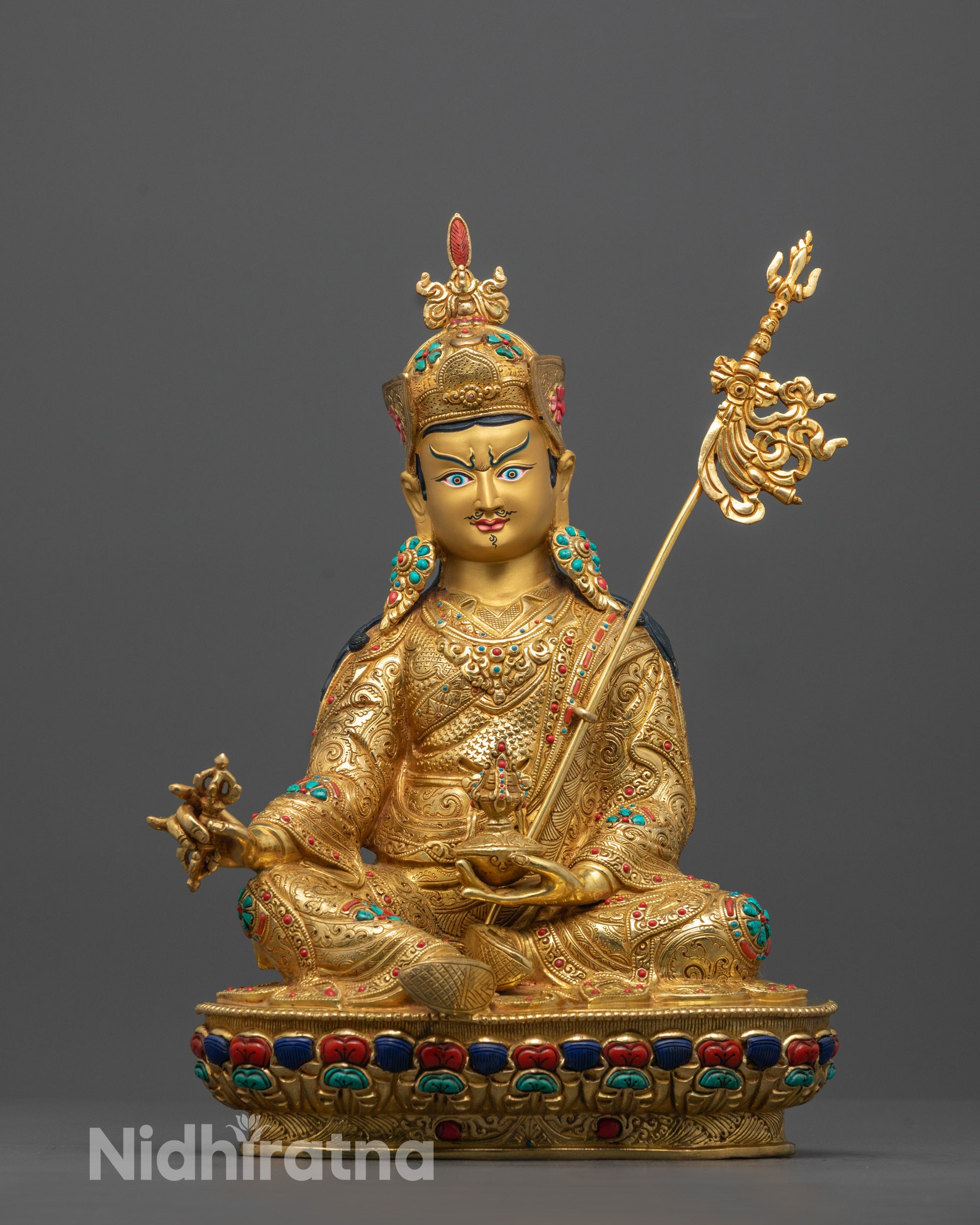 Front view of hand-carved Guru Rinpoche statue seated on lotus base, gilded in 24k gold