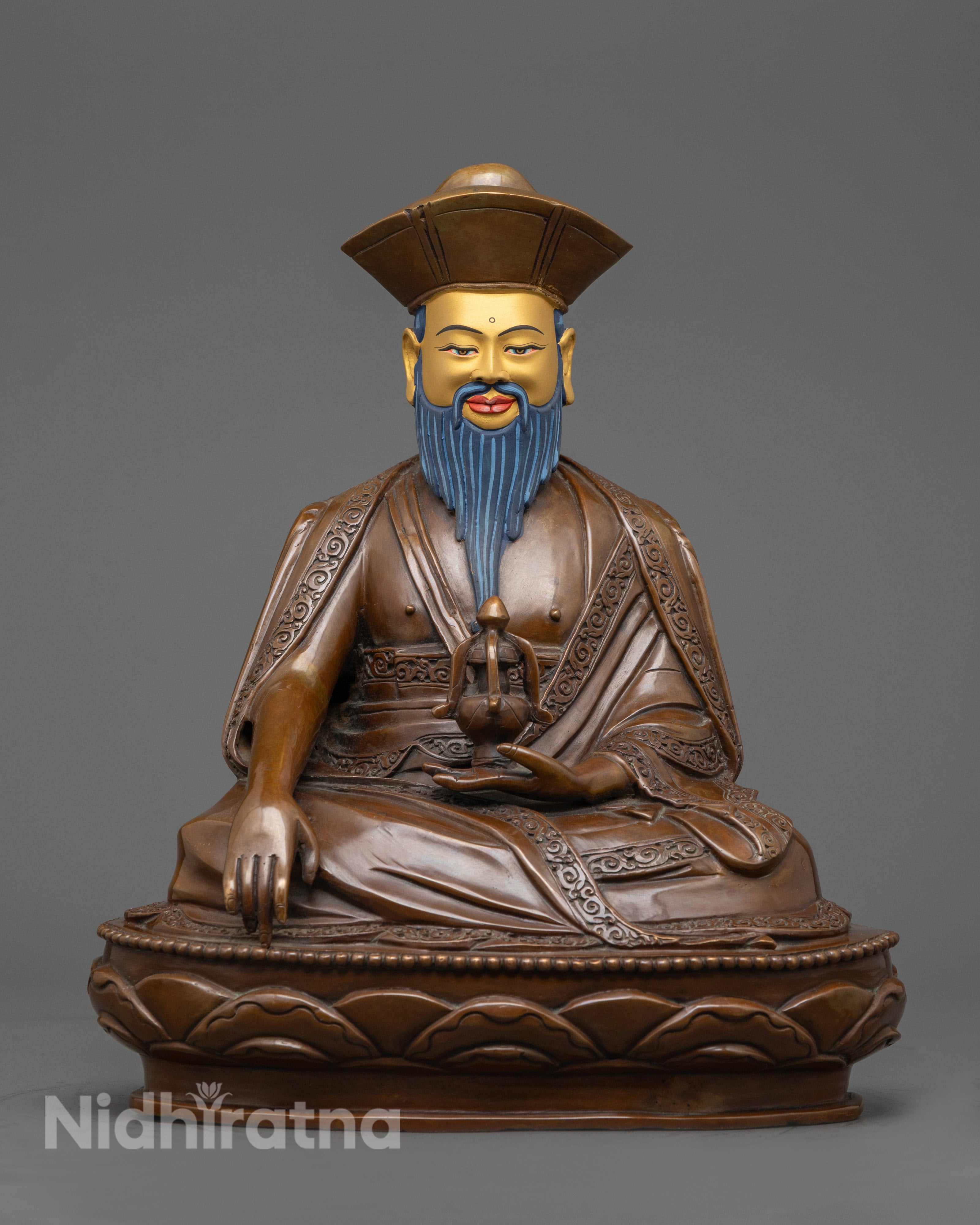 hand-carved Guru Shapdum statue seated on lotus throne with fierce expression and oxidized copper finish.