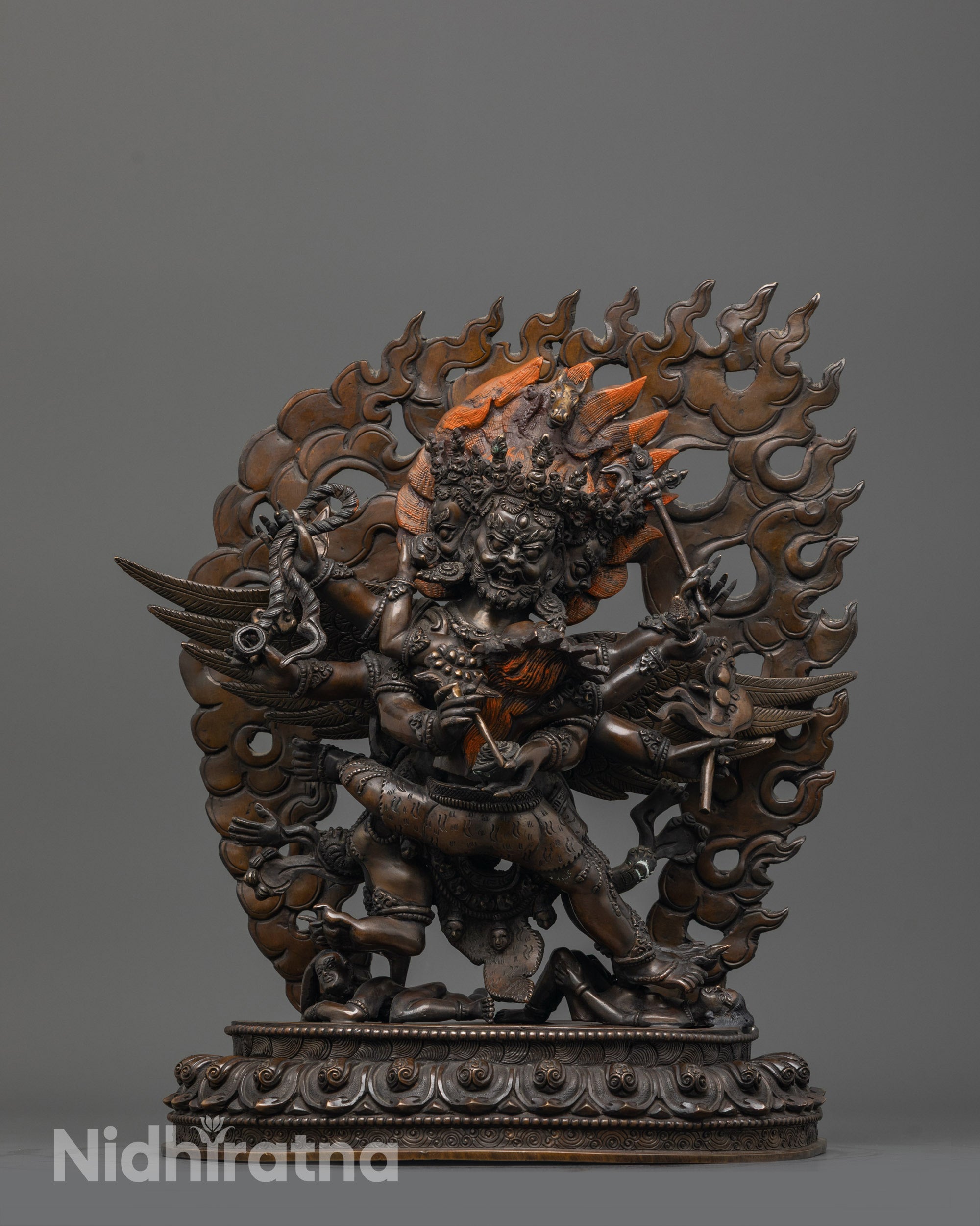 Front view of hand-carved Hayagriva with Consort Statue made from oxidized copper