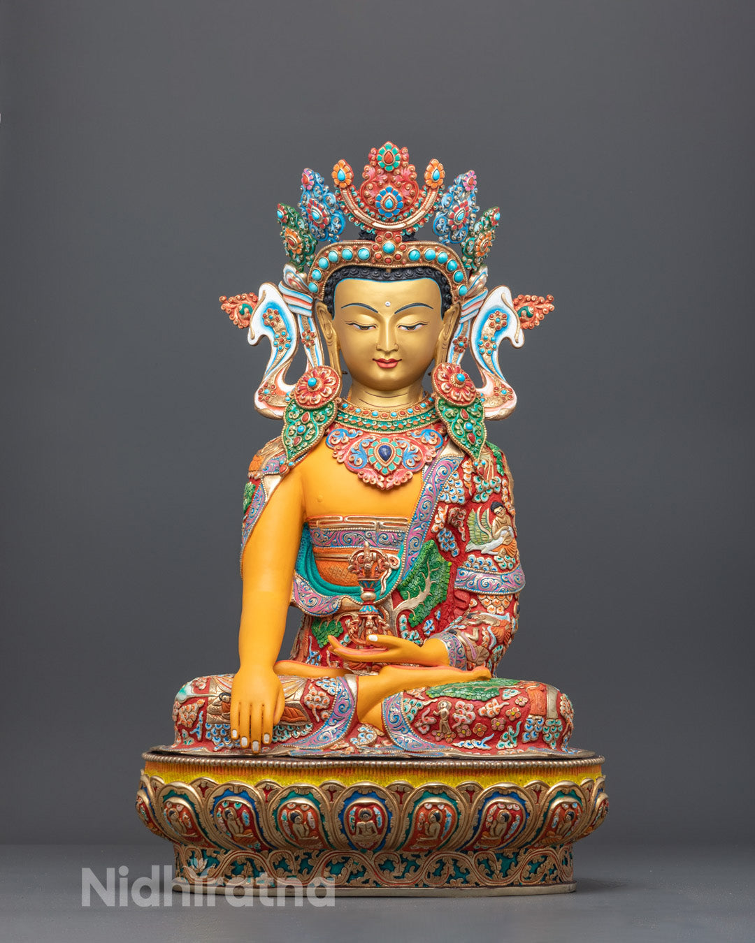 Front view of hand-carved Mitrugpa Buddha statue with 24k fire-gilded gold and yellow acrylic finish