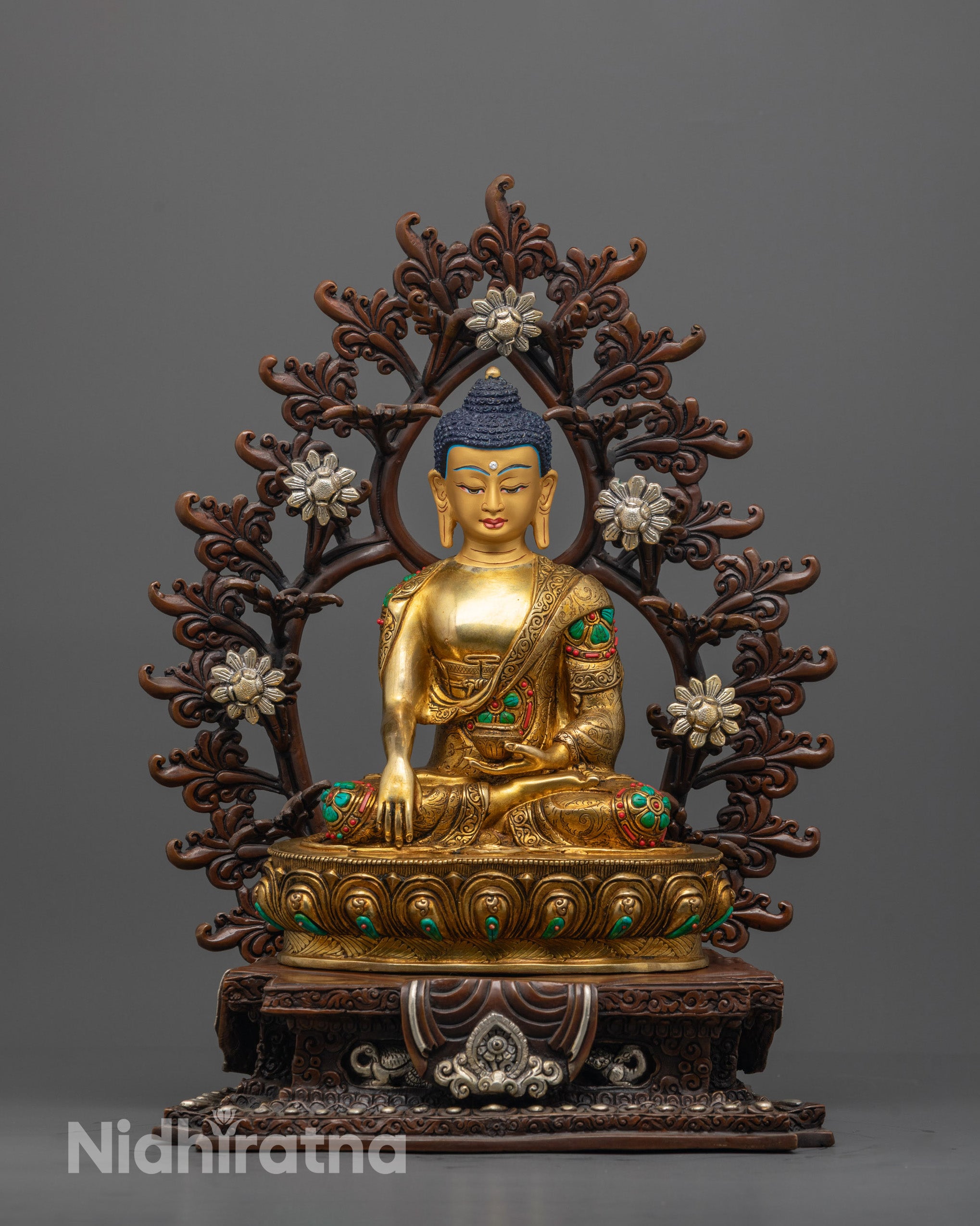Front view of hand-carved Shakyamuni Buddha Statue with 24k fire gold gilded finish