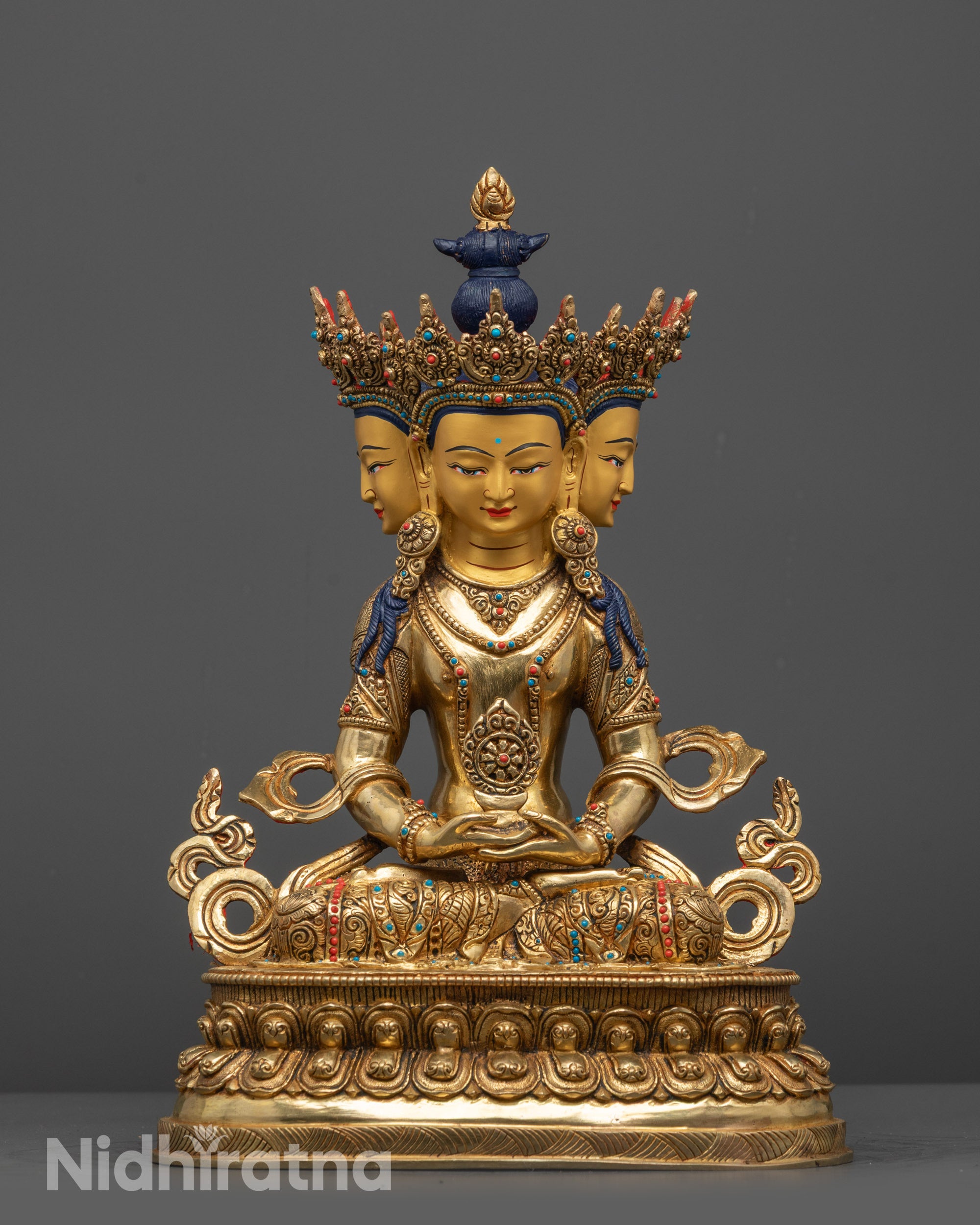 Front view of hand-carved Vairocana Buddha Statue from Nepal