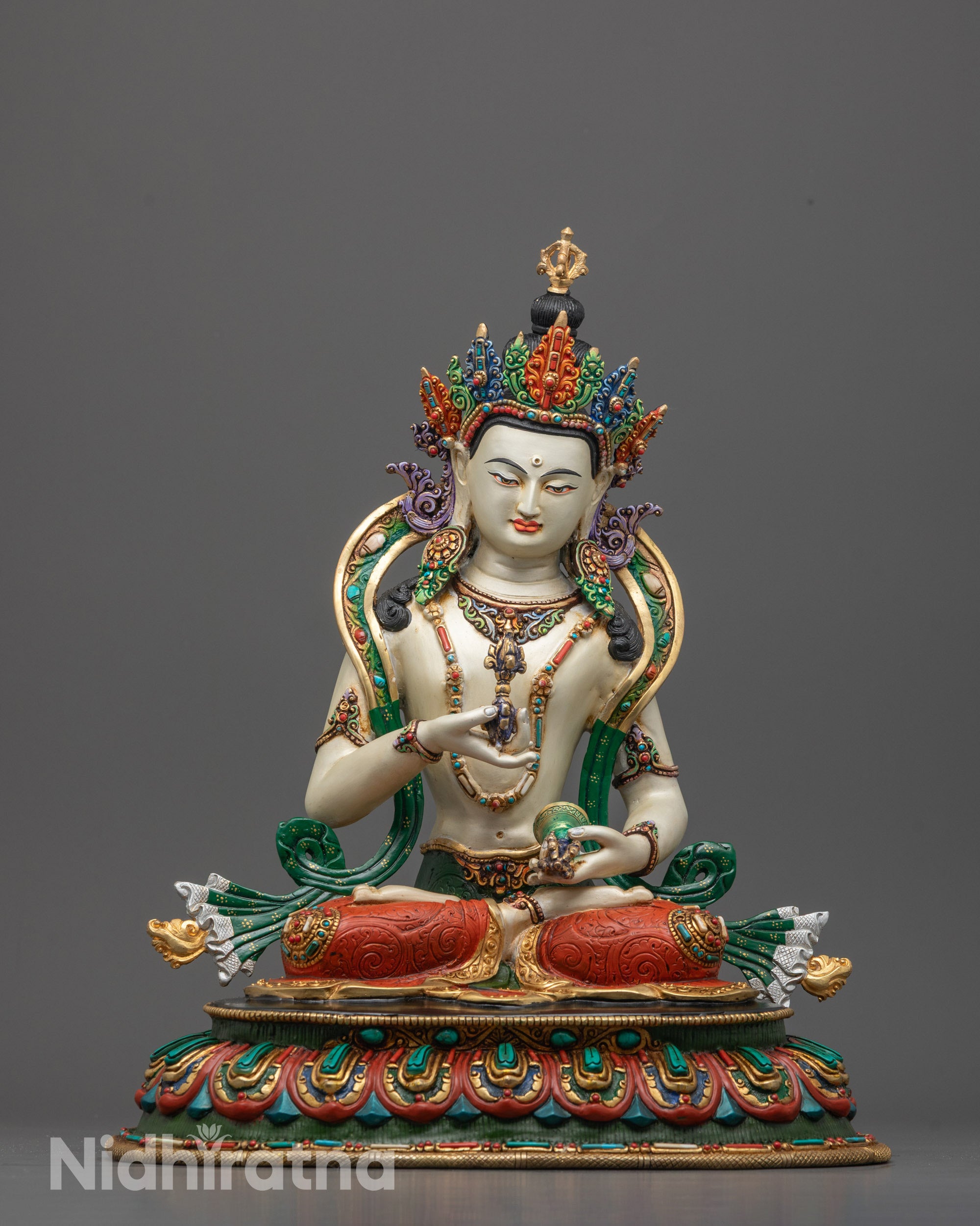 Front view of hand-carved Vajrasattva Statue seated on a lotus base