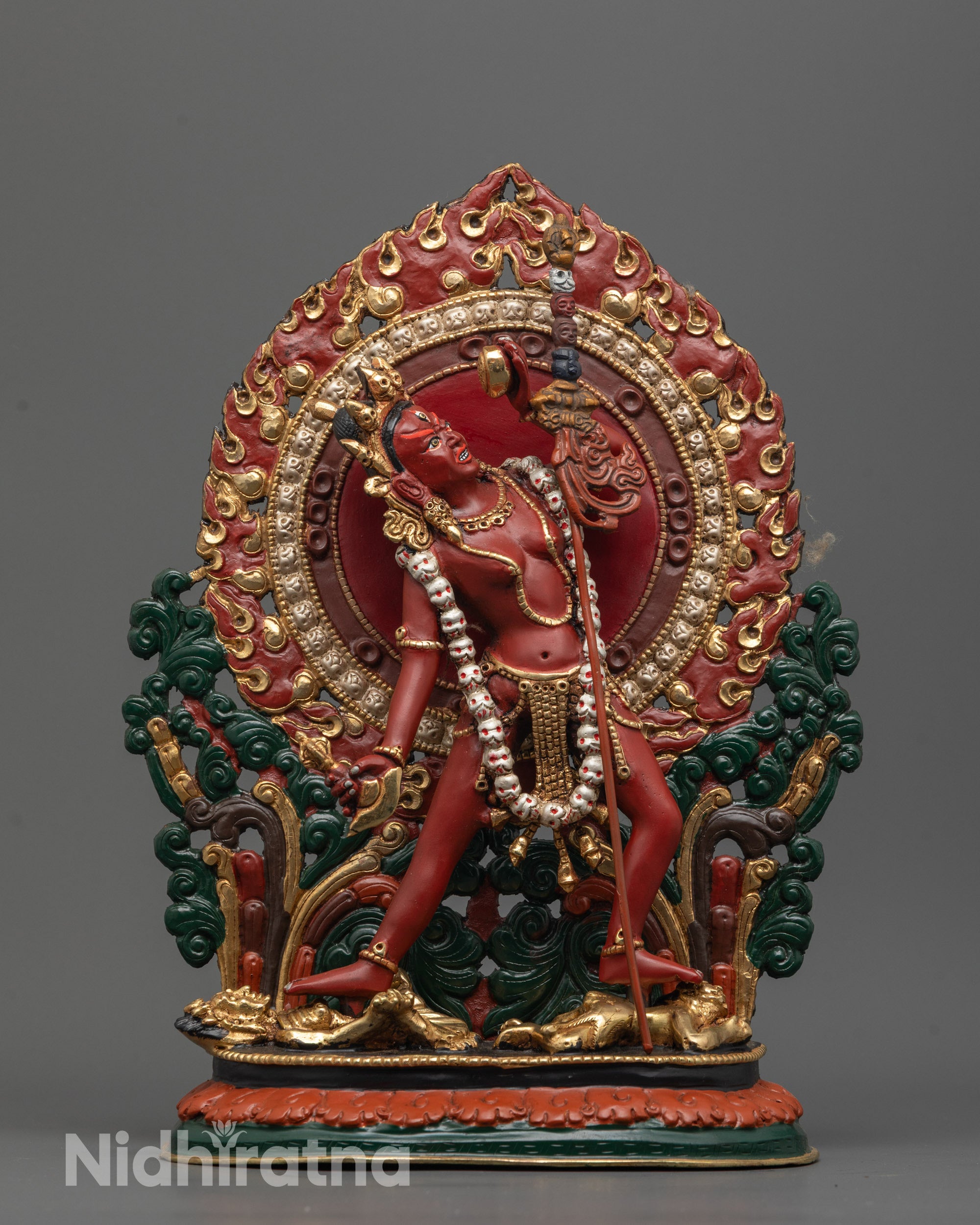 Front view of hand-carved Vajrayogini Statue from Nepal with red acrylic color