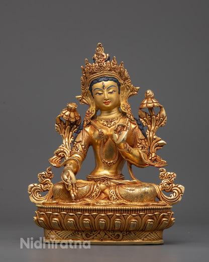 Front view of hand-carved White Tara Statue seated on lotus base with seven eyes