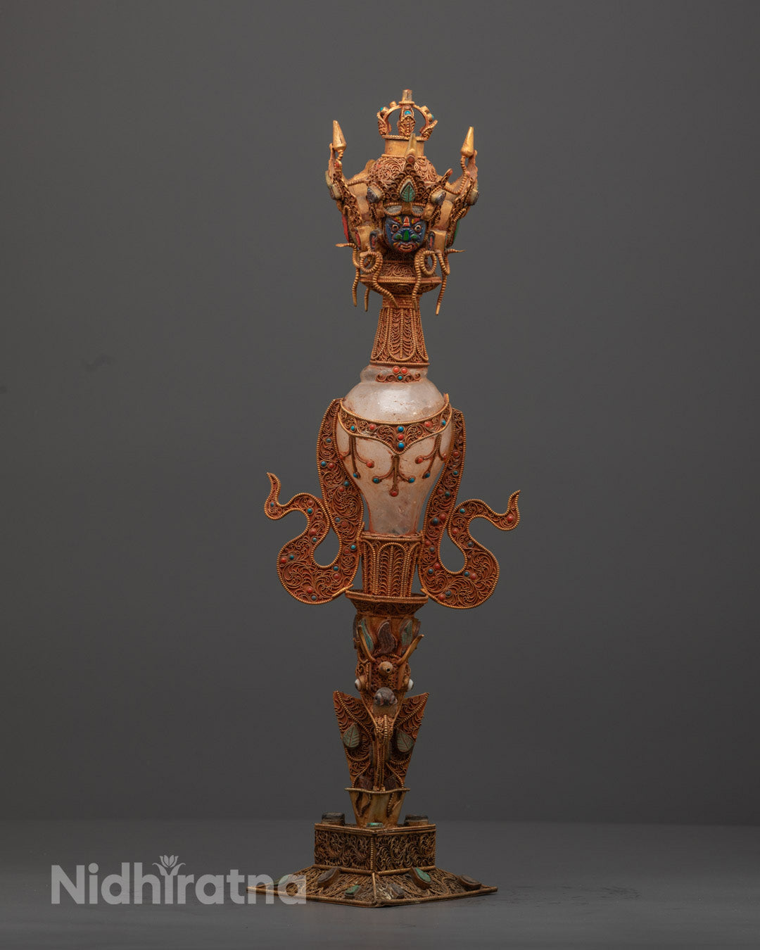 Front view of handcrafted Crystal Phurba dagger with copper and gemstone detailing