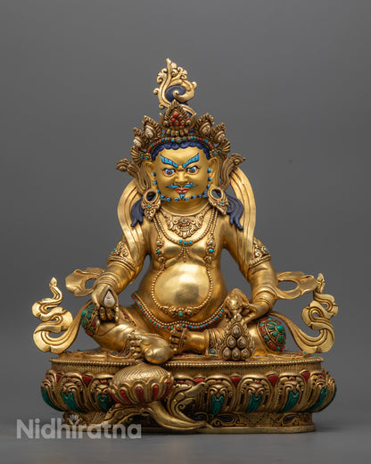 handcrafted Jambhala statue with gold fire gilding and lotus throne base.