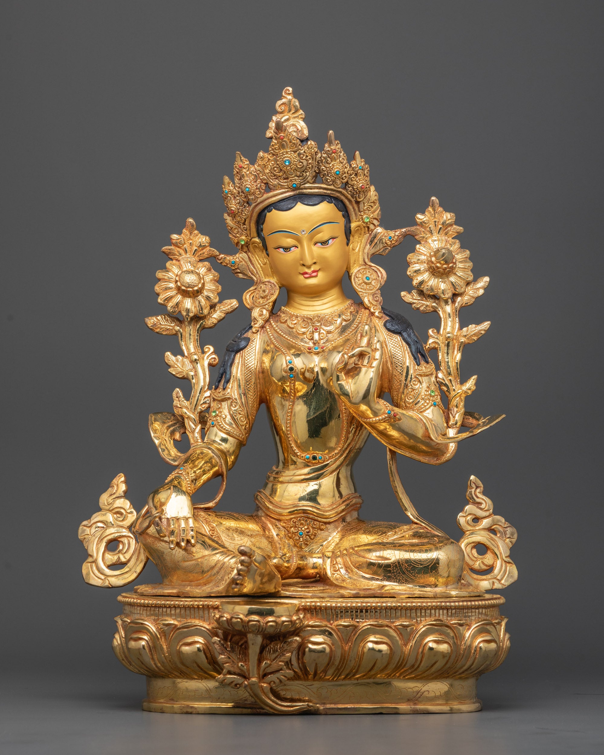 Front view of handcrafted Mother Tara Sculpture with gold gilding and semi-precious stones