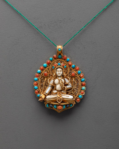 Front view of handcrafted White Tara locket with crystal centerpiece, gold-gilded filigree, and semi-precious stones – spiritual amulet from Nepal.