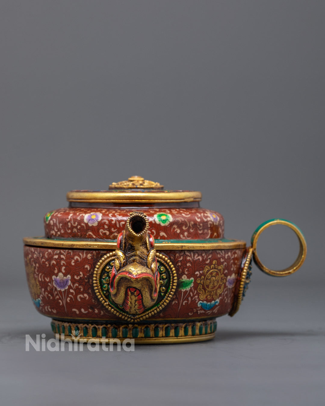 Front view of handcrafted copper ritual teakettle with vibrant acrylic detailing