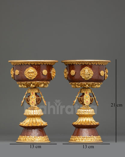 Front view of handmade Nepalese Butter Lamp Set with gold-gilded copper finish