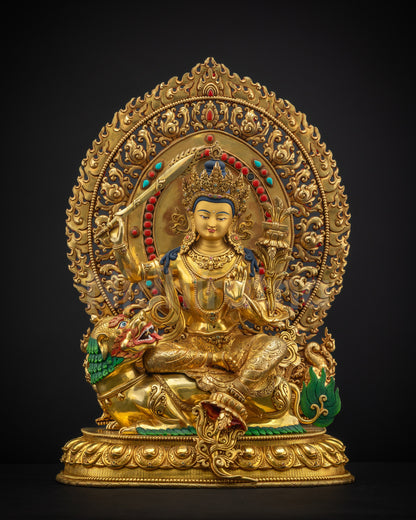 Front view of lion-seated Simhada Manjushri statue in gold fire gilding with radiant halo