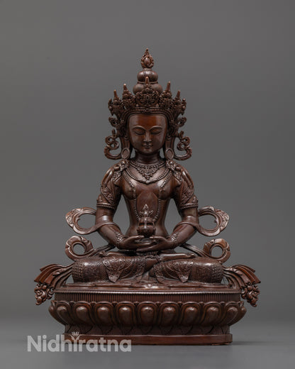 Front view of machine-made Amitayus statue showing precise electroplated oxidized copper finish