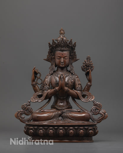 Front view of oxidized Chenrezig statue with crown and lotus base, handmade in copper