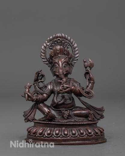 Front view of oxidized Lord Ganesha statue with serpent mala and sacred symbols