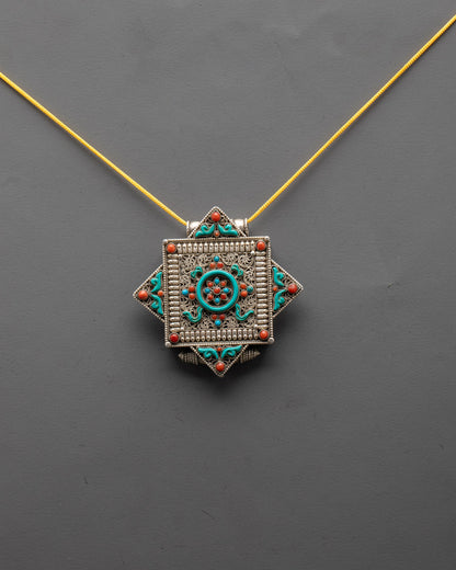 Front view of silver-plated Mandala Locket with turquoise and coral stones