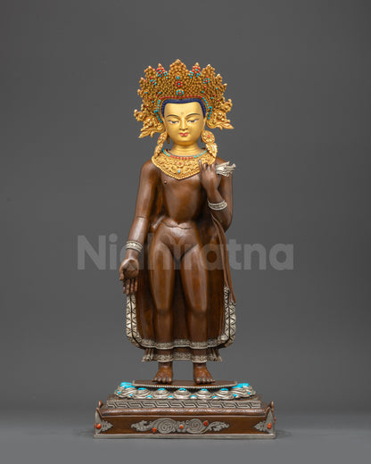 Front view of standing Dipankara Buddha statue on lotus with gold-gilded face
