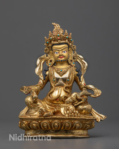Front view of the hand-carved Dzambhala Statue with 24k fire gold gilding