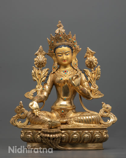 Front view of the handcrafted Green Tara Statue seated peacefully on a lotus base