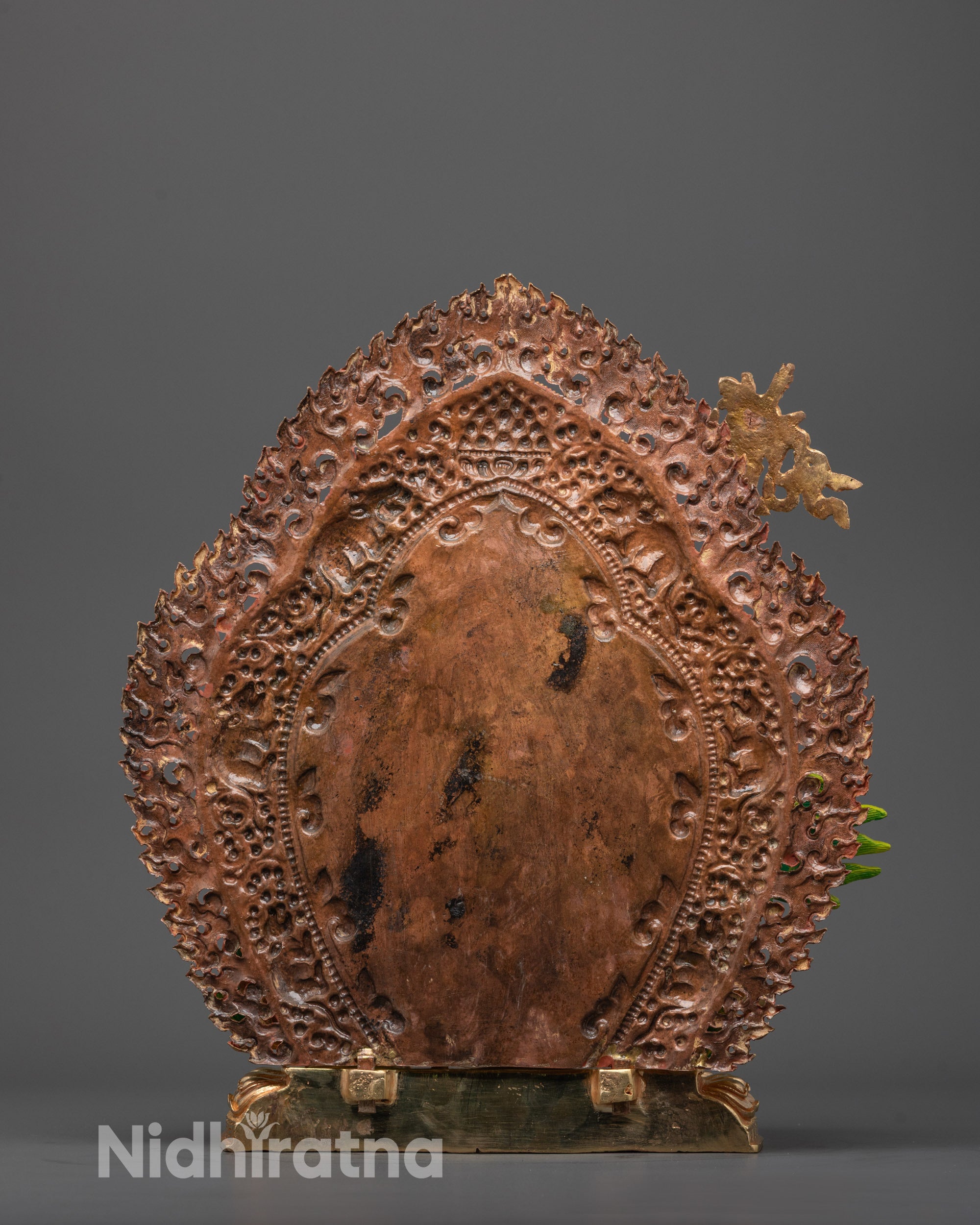 Front view of traditional Tibetan Namtoshe Statue handcrafted with gold amalgam