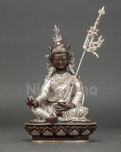 Front view oxidized Guru Padmasambhava copper statue with vajra kapala and khatvanga