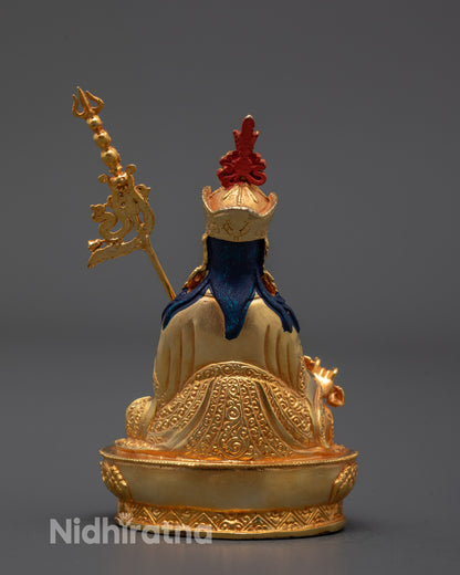 Full-body image of 24k gold-finished Padmasambhava statue showcasing traditional Tibetan
