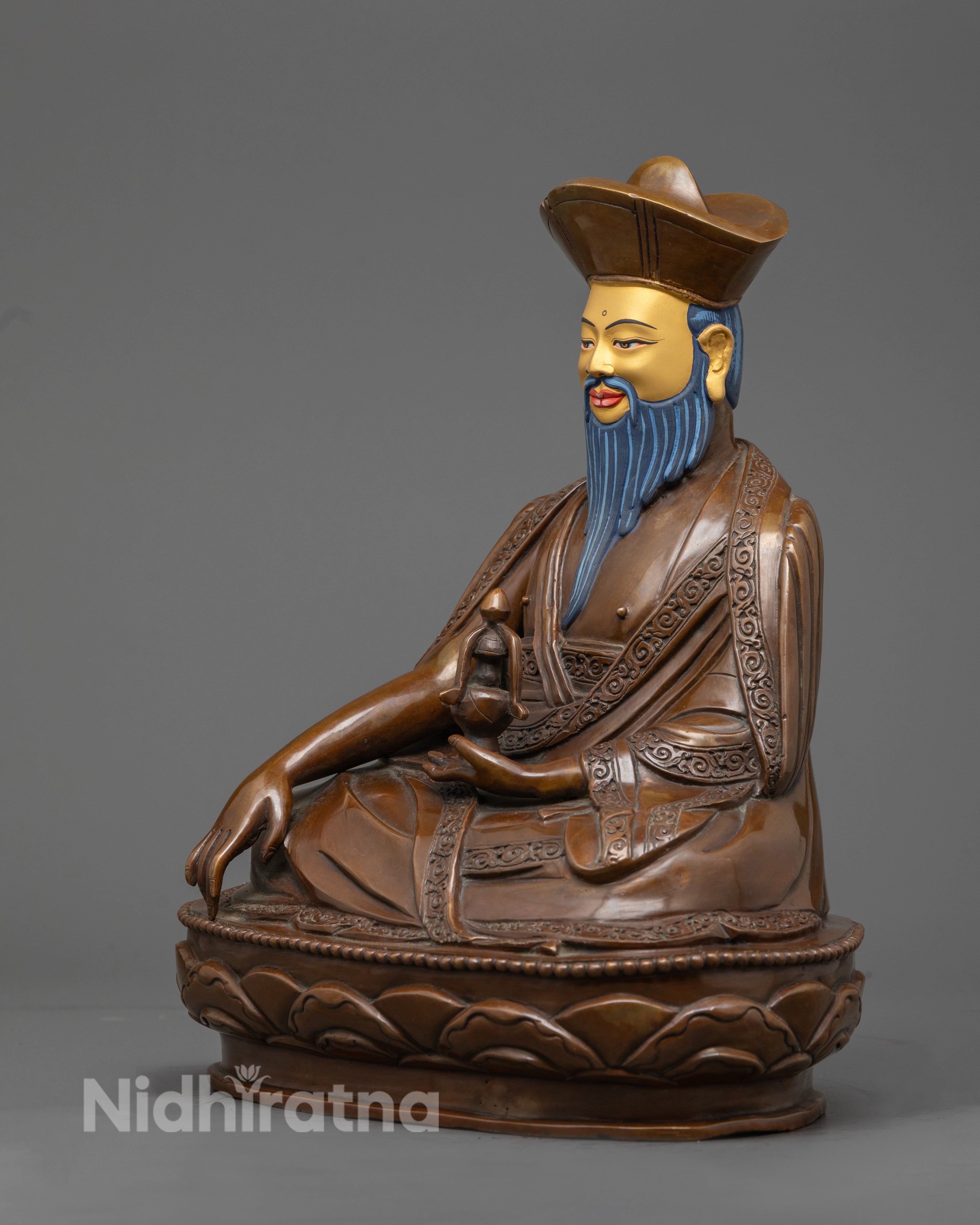 wrathful Guru Shapdum statue with halo, vibrant color accents, and semi-precious stone embellishments.