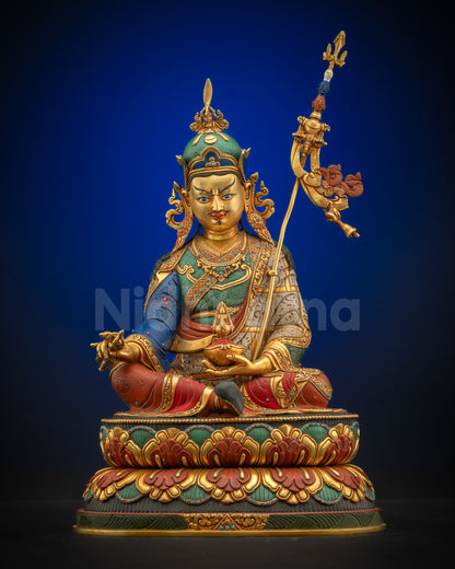 Full front view of Guru Rinpoche Padmasambhava statue seated on double-layered lotus pedestal holding Vajra and Kapala