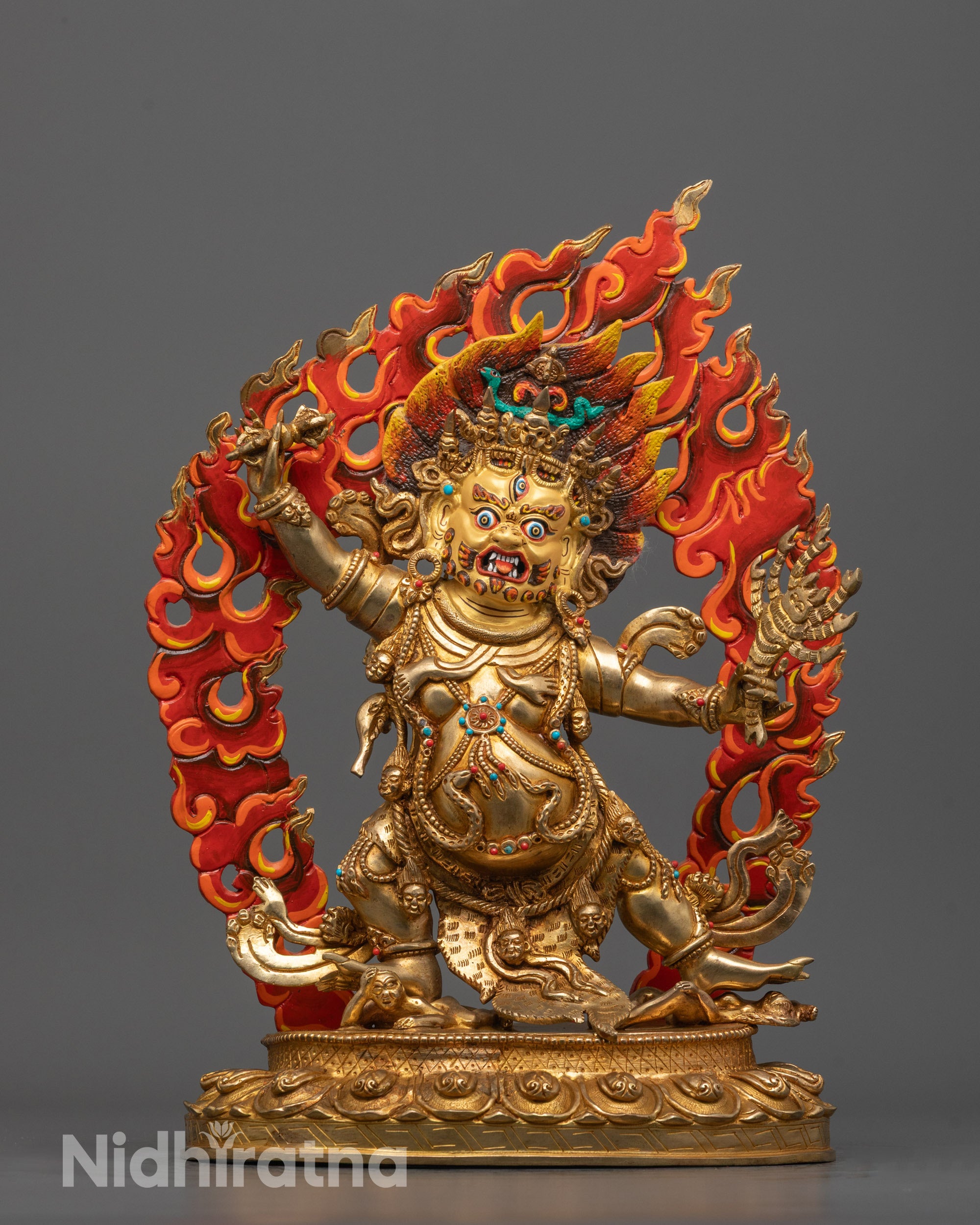Full View of Guru Dragpo Statue Standing on Subdued Human Deity