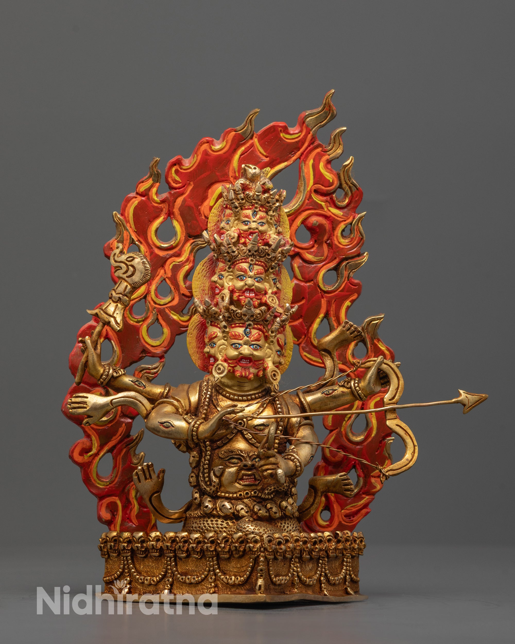 Full View of Rahula Statue with Naga Serpent Body and Fire Halo