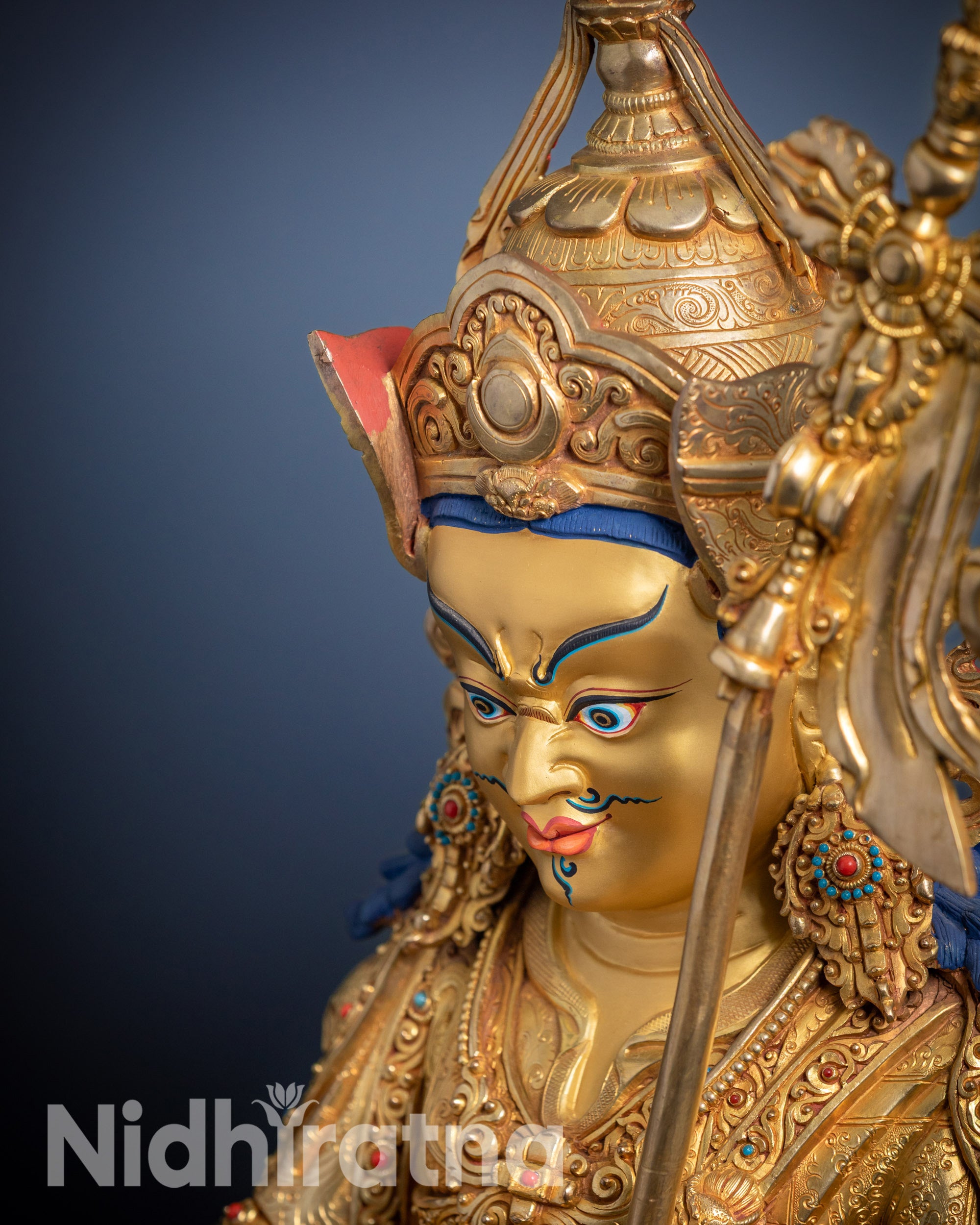 Full detailed side view showing gold gilding and sacred motif patterns