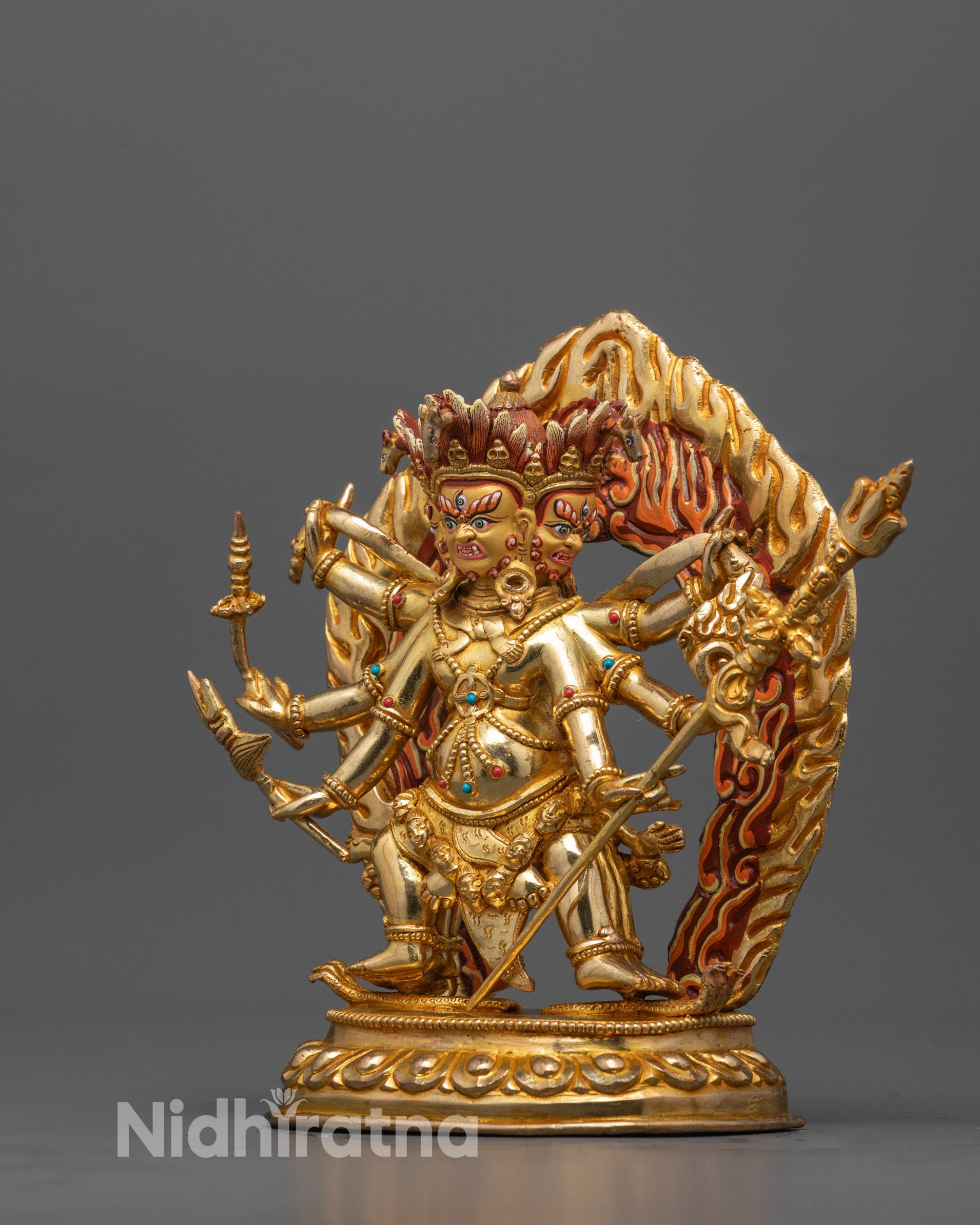 Full front image of Dharmapala Statue crafted with lost-wax method featuring multiple arms