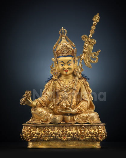 Full front view Guru Rinpoche statue with gold-gilded face and ornaments