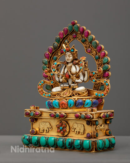 Full handcrafted Chenrezig Bodhisattva statue with detailed carvings and sacred gesture, radiating peaceful energy.