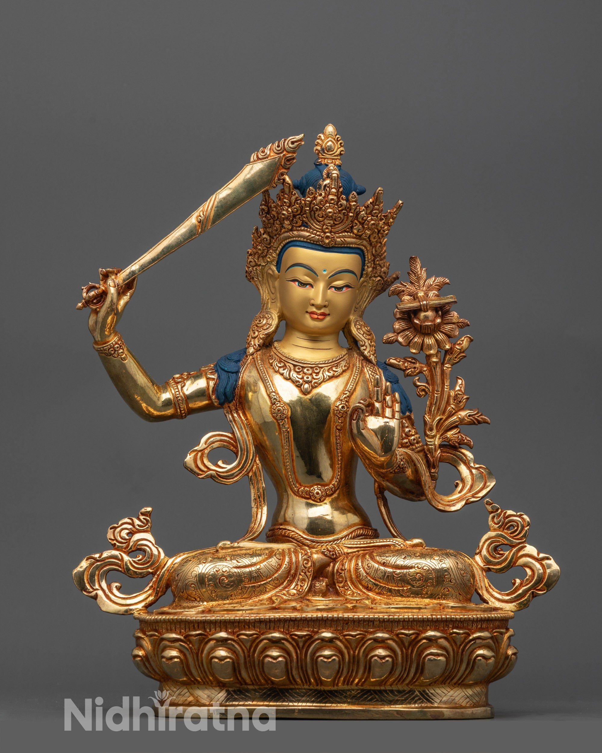 Full image of Bodhisattva Manjushri Statue seated on lotus pedestal,
