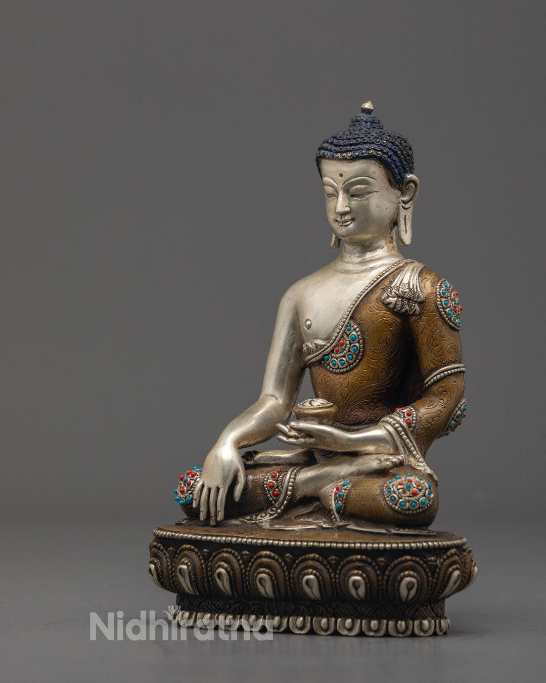 Full image of Buddha Shakyamuni Statue seated in meditation, handcrafted in Nepal using the traditional lost wax method.