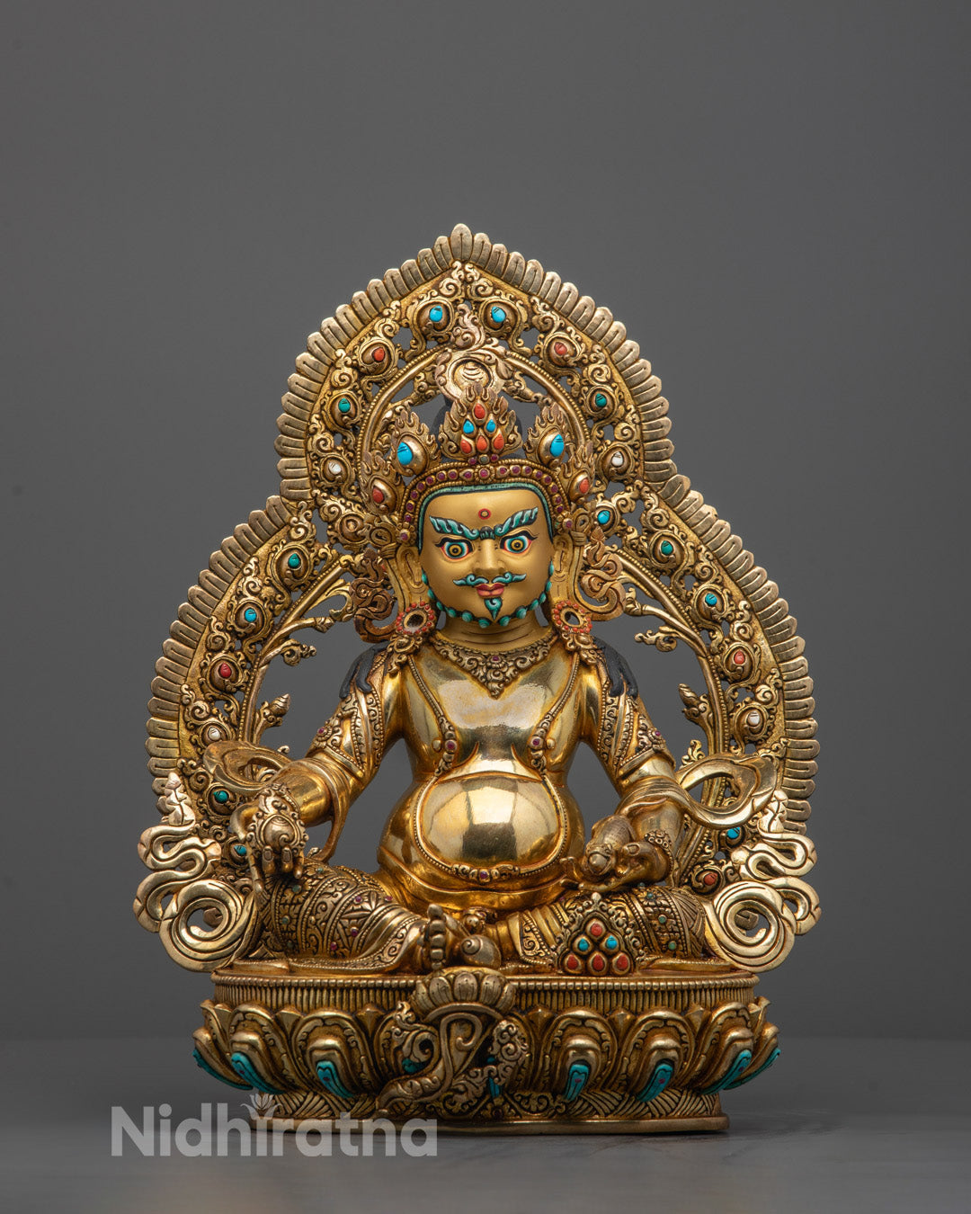 Full image of Hand-carved Dzambhala Statue seated on a lotus base, holding a citron fruit