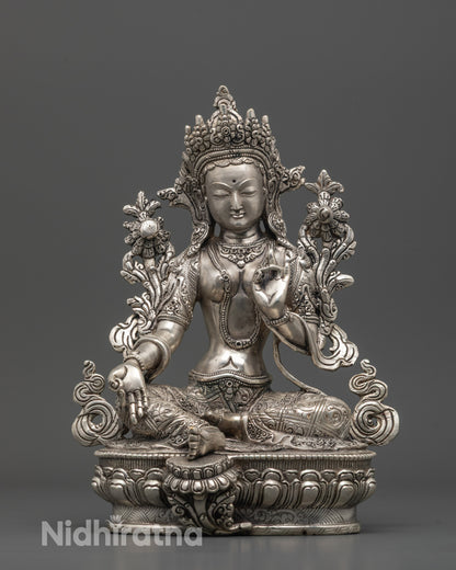 Full image of Hand-carved Green Tara Statue seated on lotus base with varada mudra
