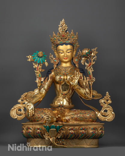 Full image of Hand-carved Green Tara Statue seated on lotus with varada mudra